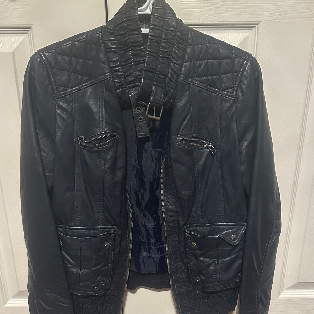 Women's navy dark blue leather Jacket. Size L but it’s more M